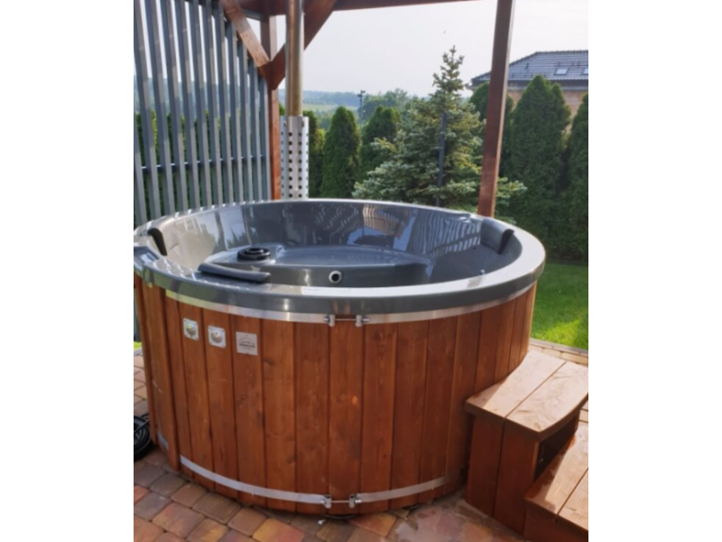 Hot tub with internal wood...