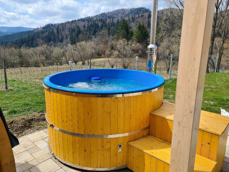 Hot tub with internal wood...